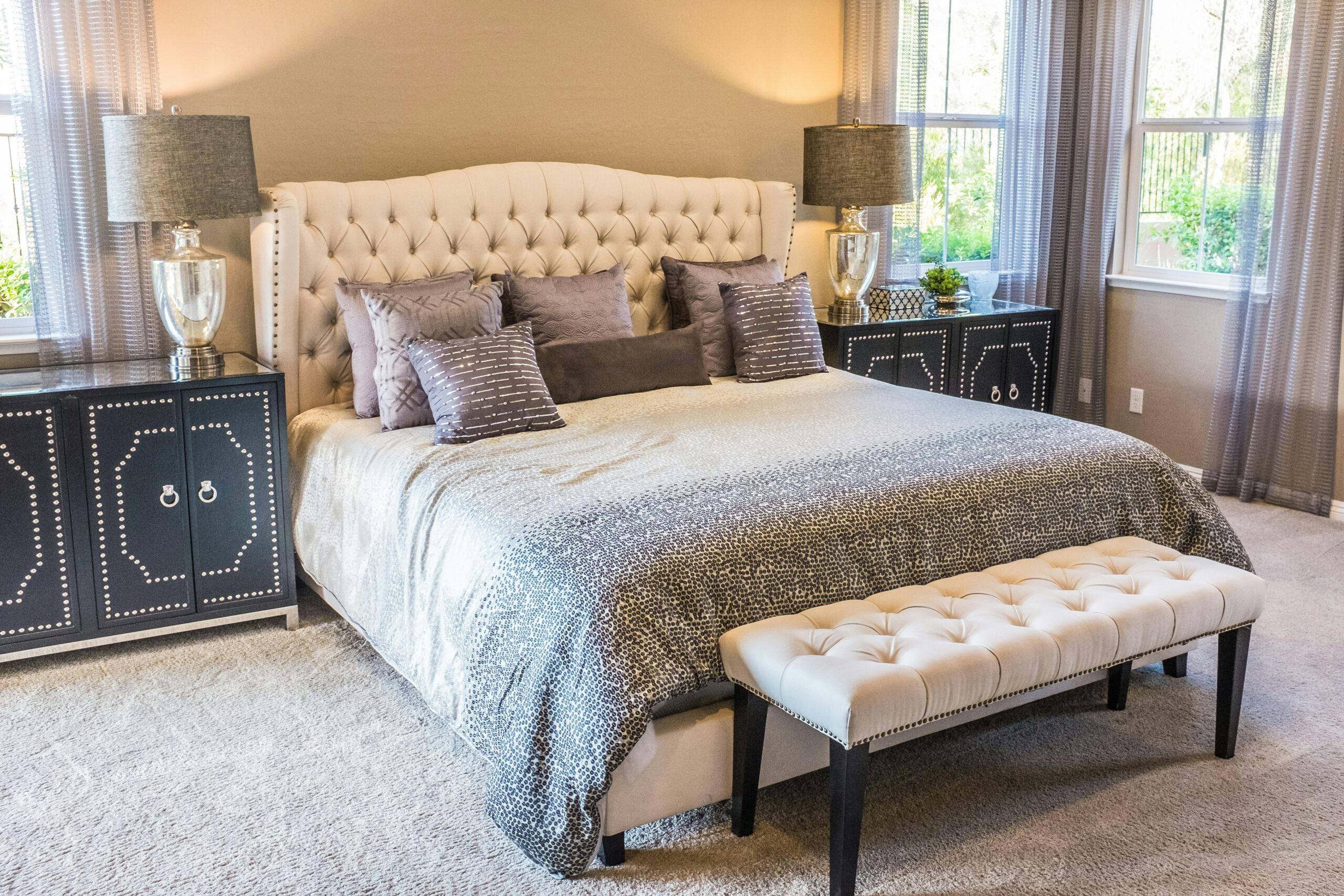 Beautifully made bed in a clean Airbnb suite ready for guests